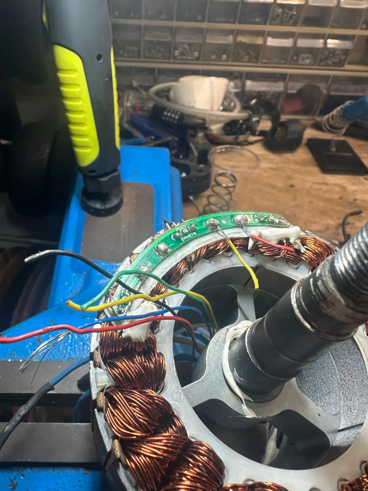 Opened electric motor showing copper windings and electrical connections